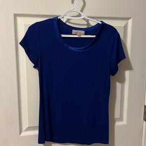 Womens med royal blue shirt with satin trim around neck.